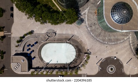 A Top Down View Directly Above An Office Complex Courtyard In Uniondale, NY. It Shows An Empty Water Fountain And The Beautiful Landscape Designs On Long Island.