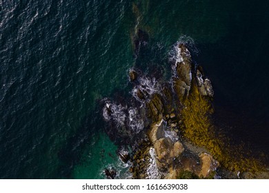 Top down view of dramatic ocean coastline
