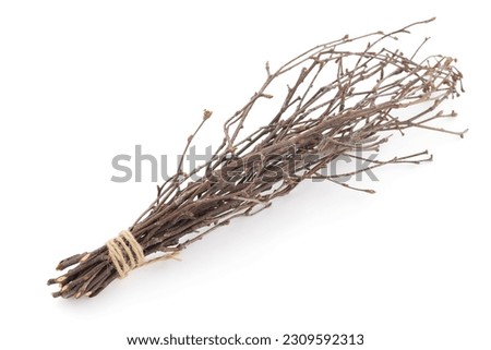 Top down view of dried twigs tied up on a white background. Isolated on white. Branches. 
