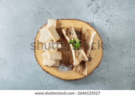 A top down view of an entree of bone marrow.