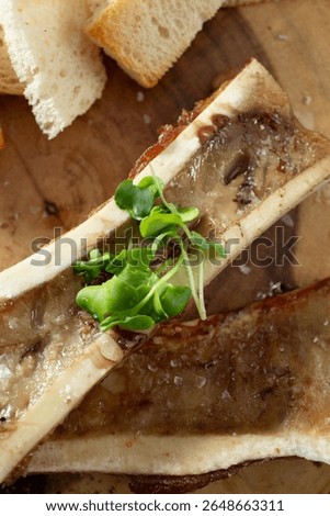 A top down view of an entree of bone marrow.