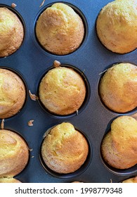 Top Down View Of Freshly Baked Cupcakes In A Muffin Tray Having Just Come Out Of The Oven