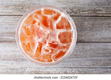 A Top Down View Of A Fruit Tea Beverage.