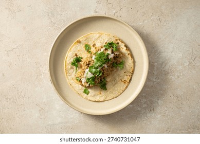 A top down view of a ground beef taco.