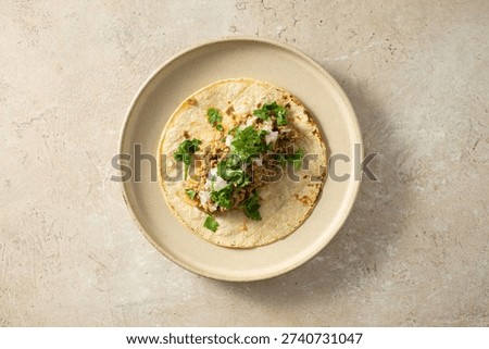 A top down view of a ground beef taco.