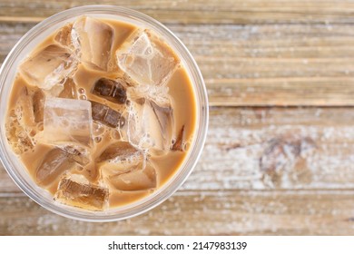 A Top Down View Of An Iced Milk Coffee Drink.