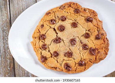 A Top Down View Of A Large Chocolate Chip Cookie.