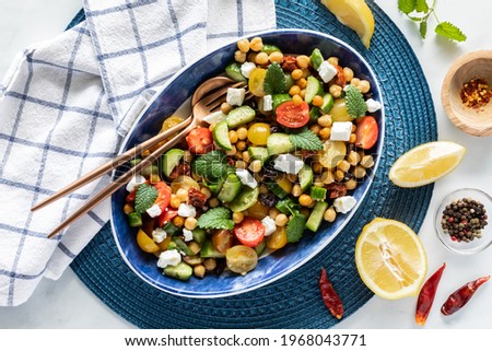 Similar – Mediterranean lunch or dinner with roasted dorado fishes, homemade focaccia bread , olive oil and olives served on rustic table with tableware and kitchen utensils, top view.