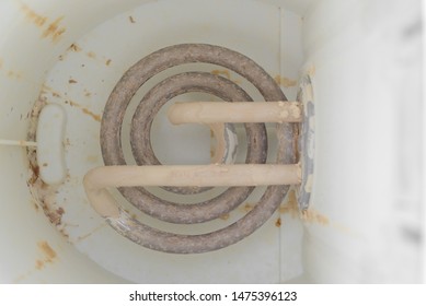 A Top Down View Of Limescale Build Up Inside Of A White Kettle