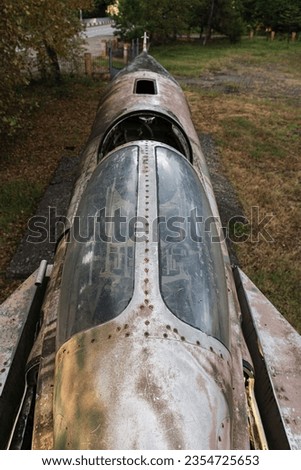 top down view of old soviet figher jet front side and pilot seat