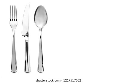 A top down view on a cutlery in white background