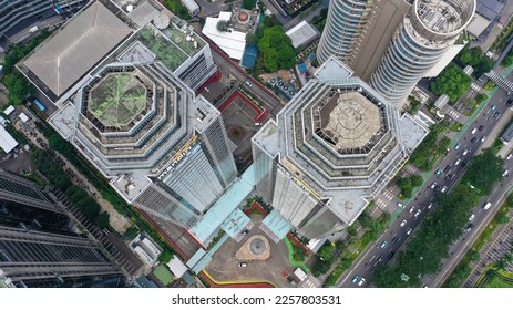 Top down view on different sky scrapers in a big city, fly over.