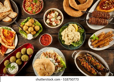 Top down view on enormous buffet of delicious freshly prepared middle eastern cuisine