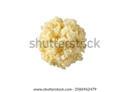 A top down view of a pile of minced garlic, against a white background.