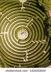 Top down view portrait of maze in the garden - Shutterstock ID 1426202024