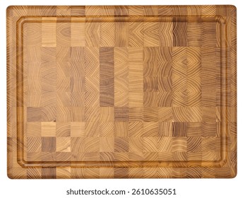 Top down view of a rectangular wooden cutting board made of end grain construction, showcasing a mosaic of wood patterns and a carved juice groove around the edge.