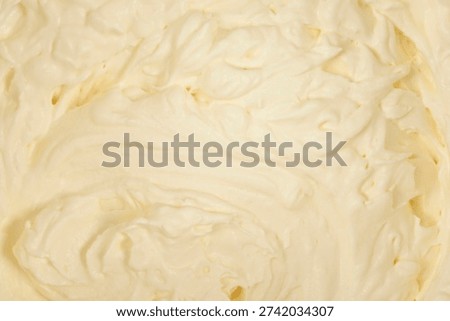 A top down view of smooth and thick vanilla pale yellow pastry cream