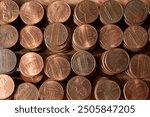 A top down view of stacks of United States pennies.