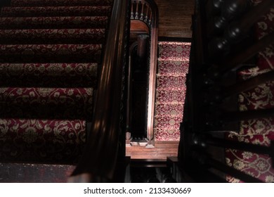 Top Down View of a Staircase inside of an Old 1900's Large Mansion