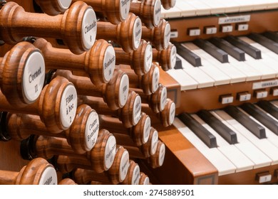 Top down view of stops on a pipe organ