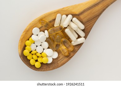 Top Down View Of Supplements For Immune System: Zinc, Vitamin C, Probiotic And Vitamin D.