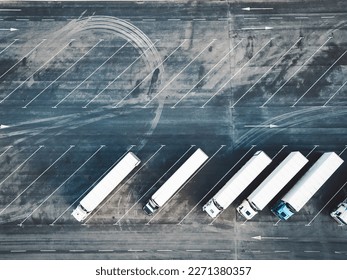 Top down view of truck parking lot at distribution center 