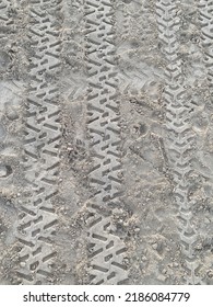 Top Down View Of Truck Tire Tracks In Sand. Wheel Motorcycle Traces  Through The Desert - Adventures Of Desert Off-road.