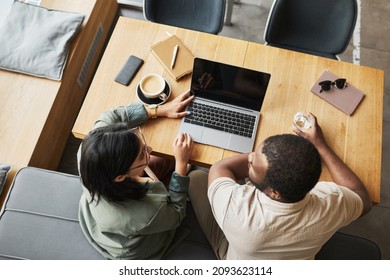 Top Down View At Of Two Business People Meeting At Cafe Table And Discussing Work, Copy Space