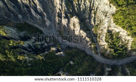 Top Down View Of Valley River Forming Putangirua Pinnacles In new Zealand 