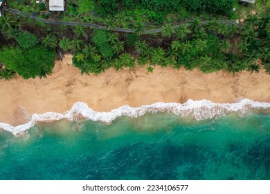Top drone view from  the waves breaking on Jale beach  at south of Sao Tome,Africa