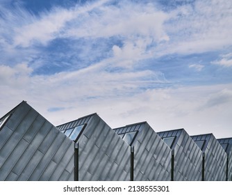 Top Edge Of The Buildings And Blue Sky 