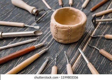 Top flat view of Pottery art tools, manual craft work concept - Shutterstock ID 1199803336