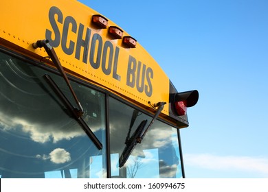 A Top  Front Of A Schoolbus Over A Blue Sky