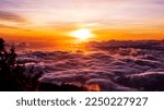 The top of Haleakala National Park (East Maui Volcano) in Maui, Hawaii, pictured above the clouds at sunset.