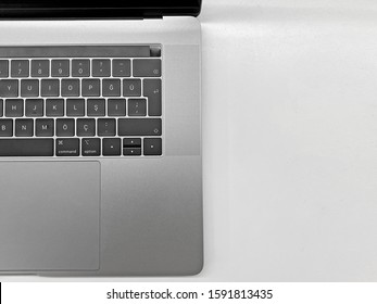 Top half of keyboard and screen view of laptop computer. space gray latest model laptop