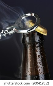 Top Of Open Wet Beer Bottle On Dark Background