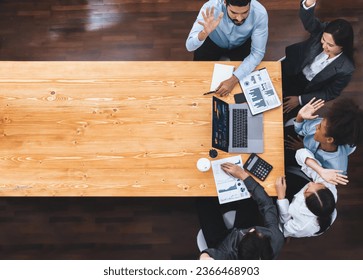 Top panorama view diverse business team celebrate successful meeting with high-fives and expressions of happiness in corporate office meeting with unity success and professional integrity. Concord - Powered by Shutterstock