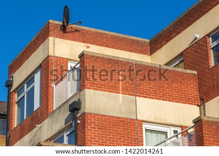 Top part of a red brick block in London