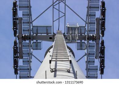 Top part of ski-lift support on ropes, minimalism view - Powered by Shutterstock