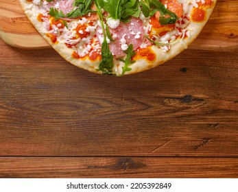 Top Quality Uncooked Italian Pizza With Spinach And Meat On A Wooden Tray And Table. Cook At Home Product. Top Range Ingredients. Classic Meal. Top Down View. Copy Space