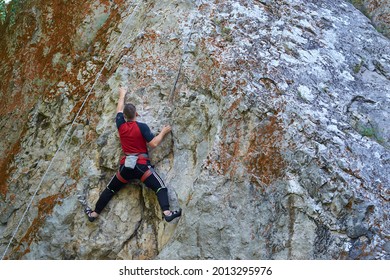 Top Rope Climbing. Extreme Outdoor Sports. Climbing In The Summer, Training For Beginners. Easy Climbing Track.