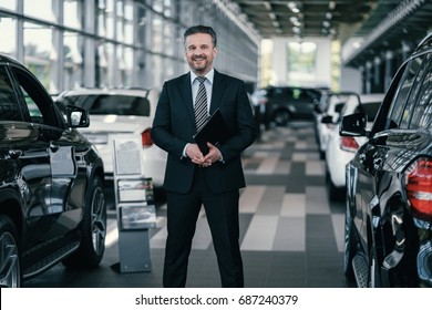 Top Sales Manager At Dealership Showroom