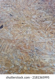 The Top Of The School Desk,  Brown Wood Base That Is Filled With Abstract And Pen Scribbles.