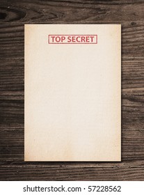 Top Secret Document On Old Wooden Table.