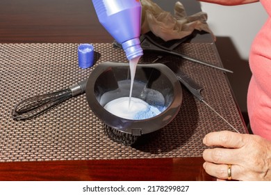 Top Shot Of A Black Bowl With The Preparation Of A Professional Mixture For Coloring Hair At Home