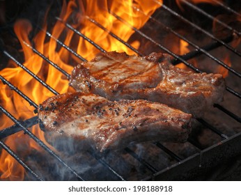 A Top Sirloin Steak Flame Broiled On A Barbecue, Shallow Depth Of Field