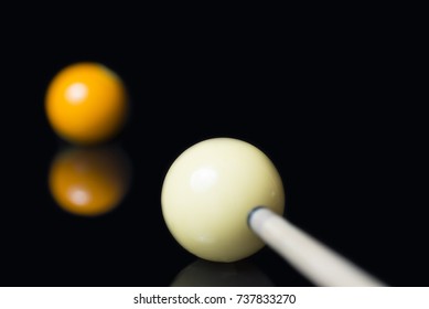 Top Spin Shot Of A Pool, Billiard Balls, White Cue Ball And Yellow Nr. 1 Ball On A Black Organic Glass With Reflections Before Tournament In Europe, Usa.