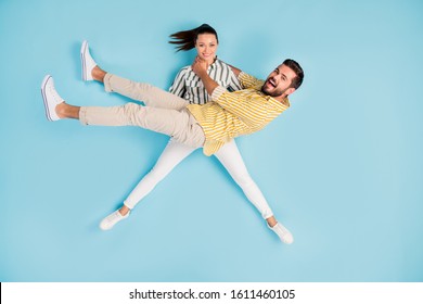 Top View Above High Angle Flat Lay Flatlay Lie Concept Full Length Body Size View Of Nice Crazy Girl Carrying Guy Having Fun Isolated On Bright Vivid Shine Vibrant Blue Turquoise Color Background