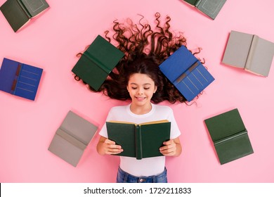 Top View Above High Angle Flat Lay Flatlay Lie Concept Portrait Of Her She Nice Lovely Focused Cheery Wavy-haired Girl Reading Variety Different Book Isolated On Pink Pastel Color Background