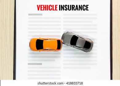 Top View Of Accident Toy Car With Toy Vehicle Insurance.